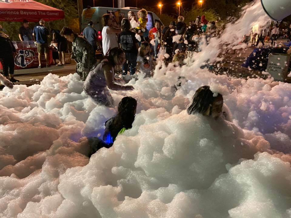 Group playing in a pile of foam.